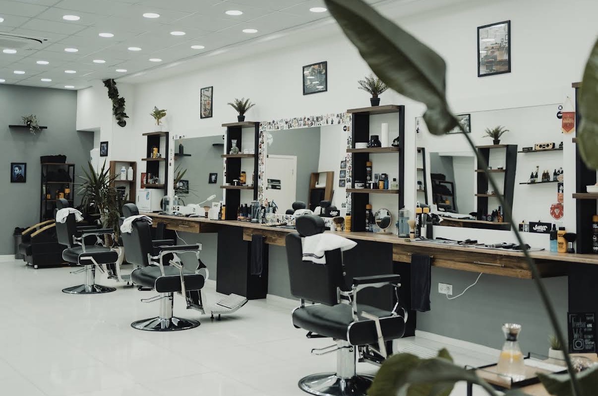 Mirror stations and grooming products at JOKER Barbershop