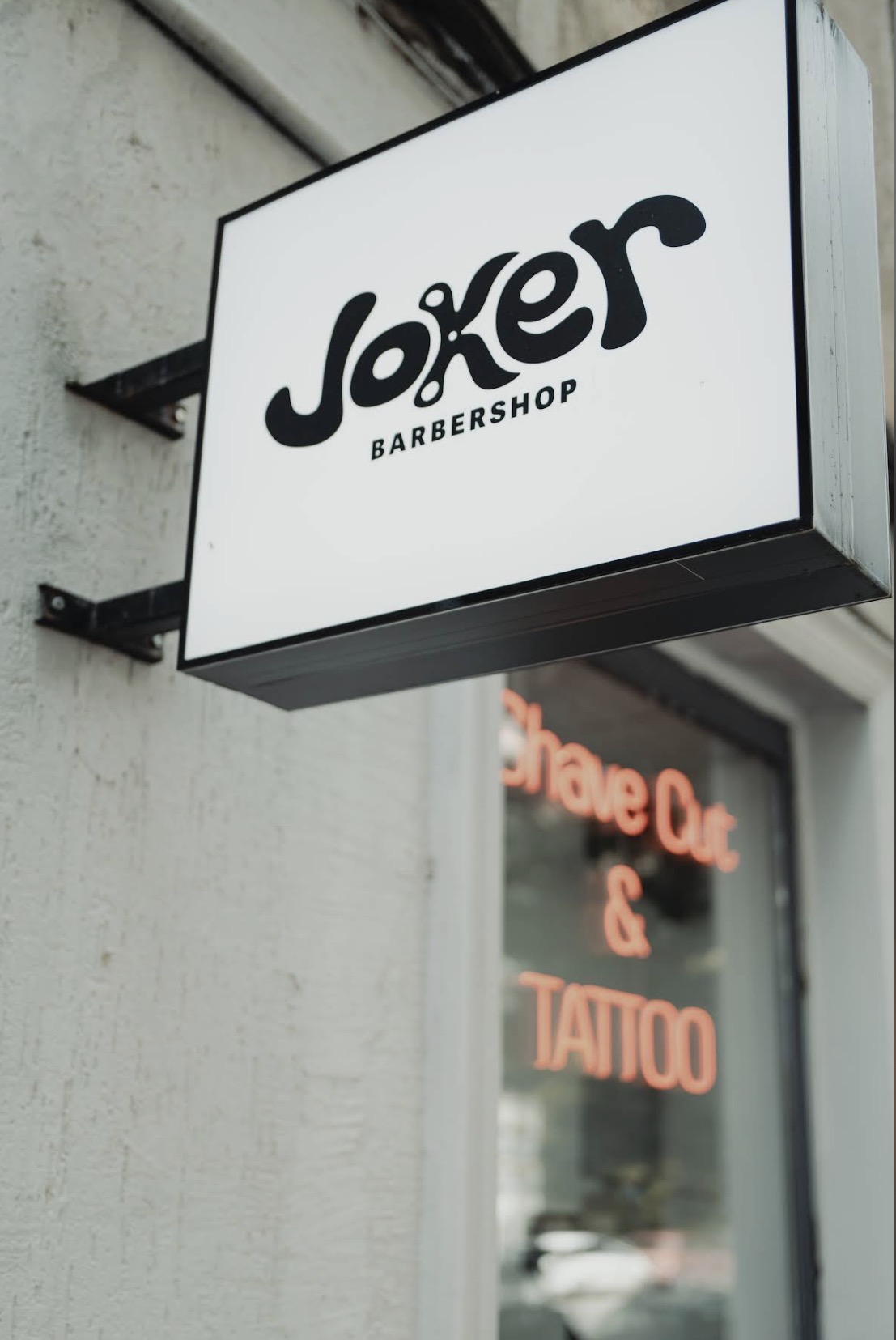 JOKER Barbershop illuminated street sign